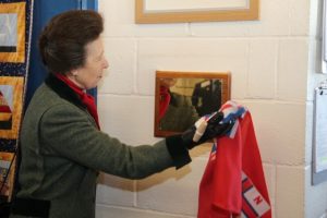 HRH Princess Anne visited Porthcawl RNLI Lifeboat Station on Monday, February 9 during their 50th anniversary year. Princess Anne unveiling a plaque in the crew room. Picture by David Williams